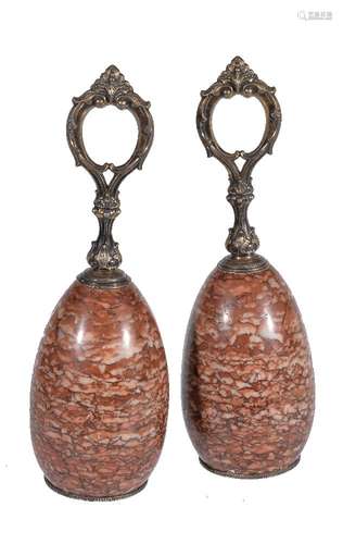 A pair of Victorian marble and silver plated metal door porters