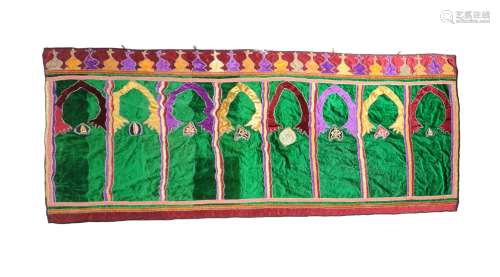 A North African coloured velvet wall hanging