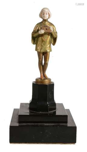 ϒ Ferdinand Preiss (1883 - 1943), The Casket Bearer, a gilt cold painted bronze and ivory figure