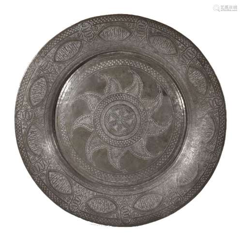 A substantial Islamic metal, probably tinned copper, dish