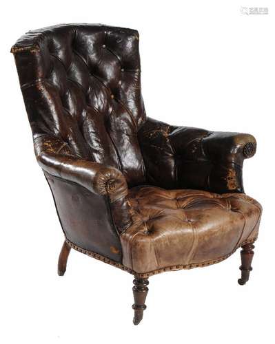 A Victorian mahogany and buttoned leather upholstered armchair