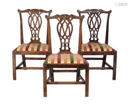 A set of three George III mahogany side chairs