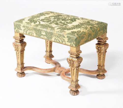 A carved giltwood stool