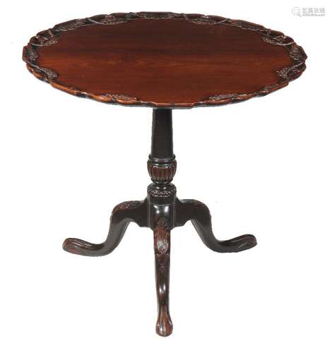 A mahogany tripod table