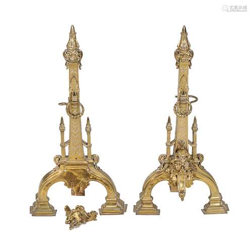 A pair of late Victorian gilt brass andirons