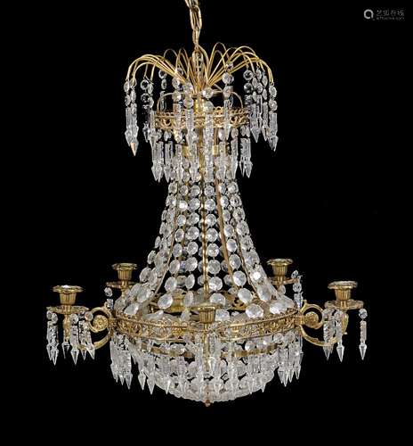 A gilt brass and cut glass five light cage chandelier in Louis XV taste