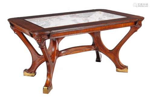 A mahogany and marble topped centre table in Art Nouveau style