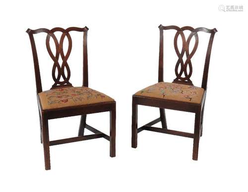 A pair of George III mahogany side chairs