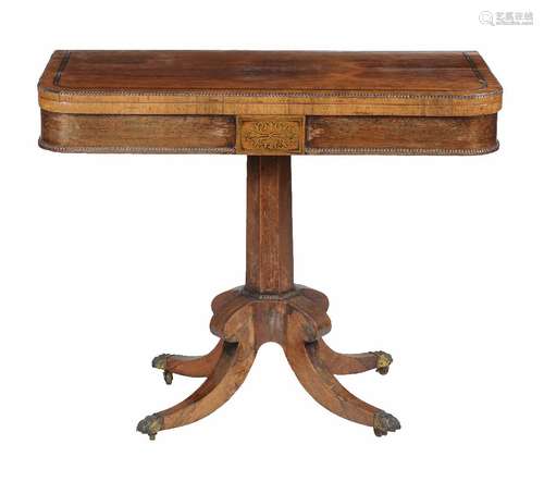 ϒ A George IV rosewood and brass inlaid card table