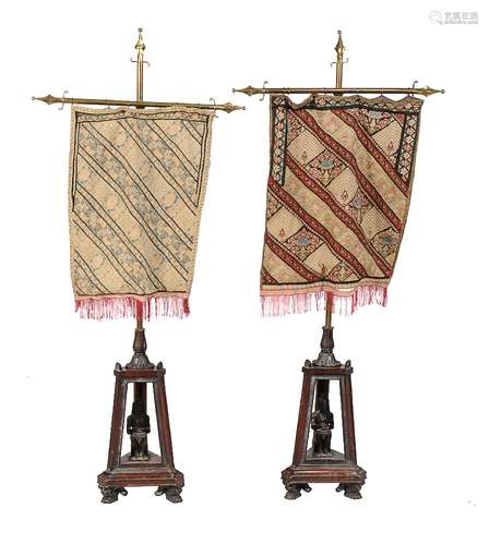 A pair of Egyptian Revival pole screens