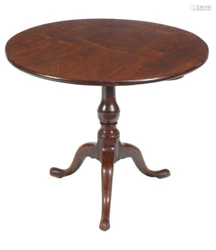 A George III mahogany tilt top supper table