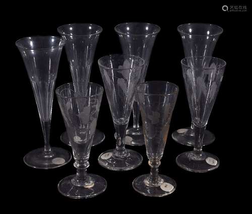 Four various short ale glasses and four fluted drinking glasses