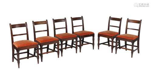 A set of seven George IV mahogany dining chairs