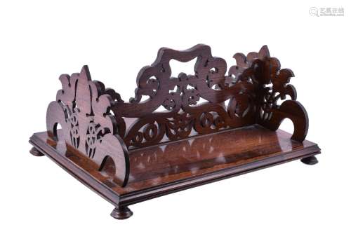 ϒ A George IV carved rosewood book carrier