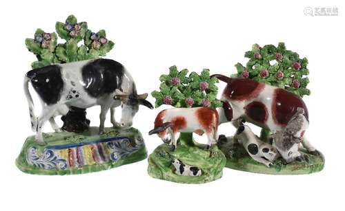 A Staffordshire pearlware bocage model of a black and white horned cow