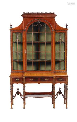 A mahogany cabinet on stand in 18th century style