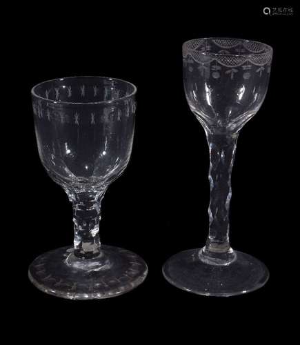 Two various facet stemmed wine glasses