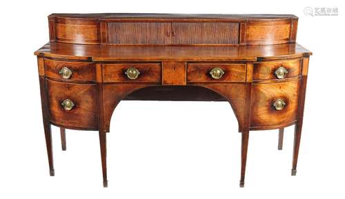 A George III mahogany and inlaid sideboard