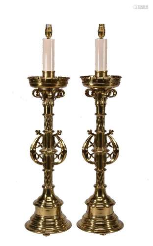 A pair of substantial Victorian gilt brass table lamps