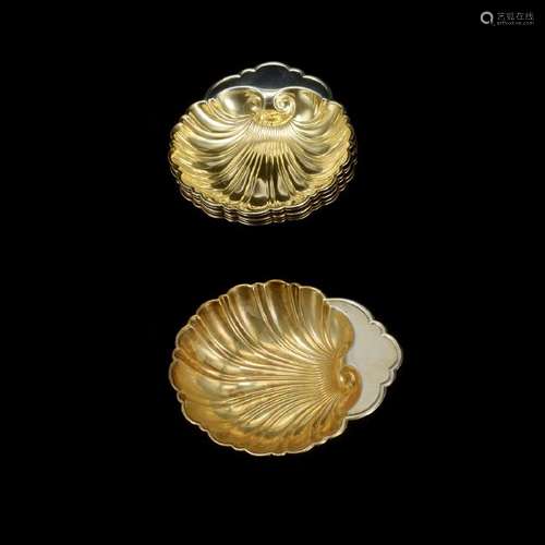 Six Shell Form Dishes with Gilt Wash Interiors.