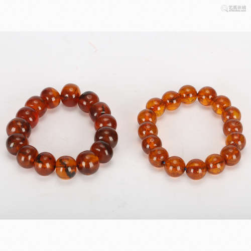 TWO CHINESE AMBER BRACELETS