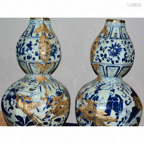 CHINESE GILT BRONZE ON BLUE AND WHITE GOURD VASE