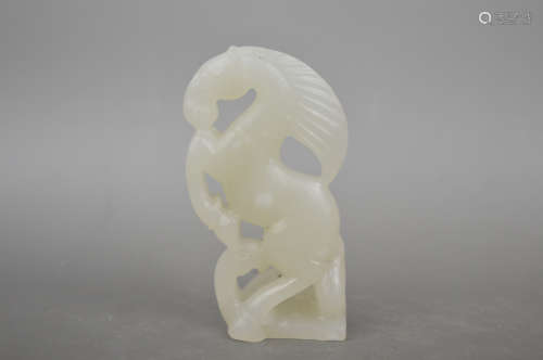 A JADE CARVED HORSE SHAPED PENDANT