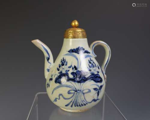 BLUE & WHITE EWER WITH GOLDEN COVER