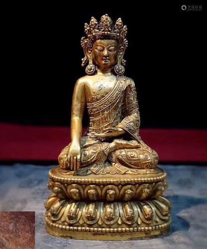 A GILT BRONZE MOLDED BUDDHA STATUE