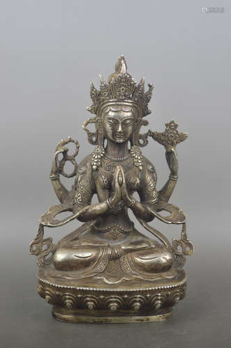 A WHITE COPPER MOLDED GUANYIN STATUE