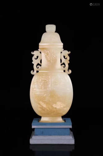 A XINJIANG HETIAN JADE CARVED BOTTLE VASE