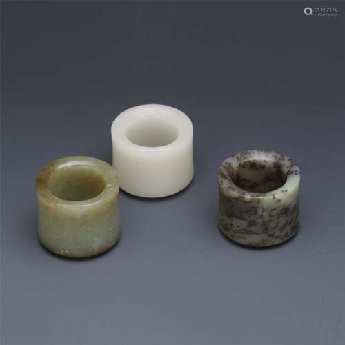 THREE  CHINESE NEPHRITE JADE ARCHER'S RINGS