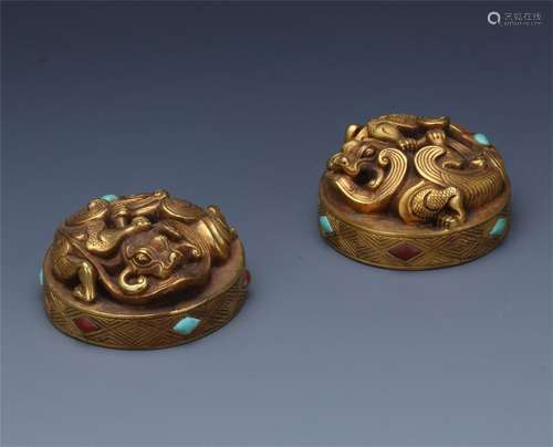 PAIR OF CHINESE GILT BRONZE BEAST PAPER WEIGHT