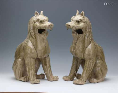 PAIR OF CHINESE PORCELAIN YUEYAO SEATING BEASTS