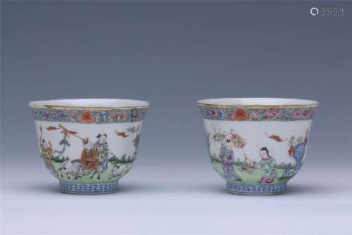 PAIR OF CHINESE PORCELAIN FAMILLE ROSE BOY PLAYING CUPS