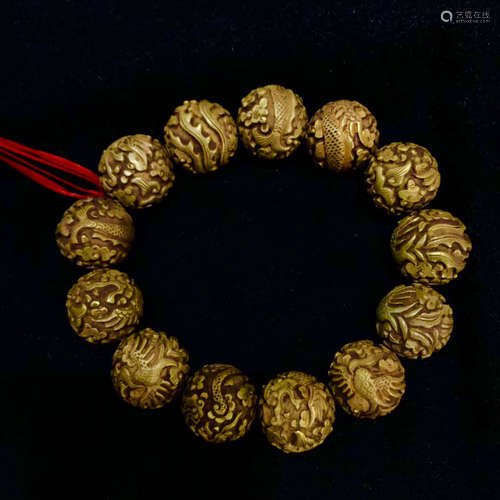 A GOLDEN BEADS STRING BRACELET