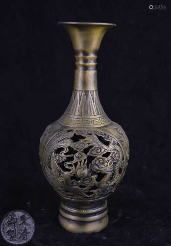 A BRONZE MOLDED HOLLOW DESIGN VASE