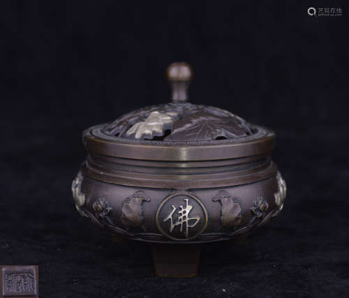 A BRONZE MOLDED LOTUS PATTERN CENSER