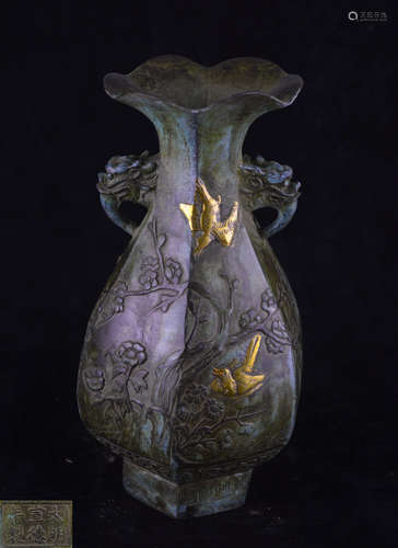 A BRONZE MOLDED FLORAL-RIM VASE