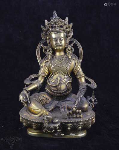 A GILT BRONZE MOLDED BUDDHA STATUE