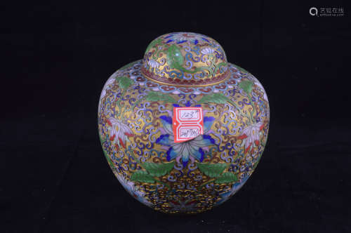 A BRONZE MOLDED COLOR FLORAL PATTERN JAR