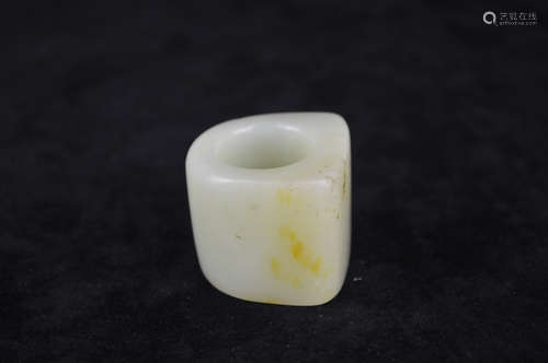 A JADE CARVED ARCHER RING