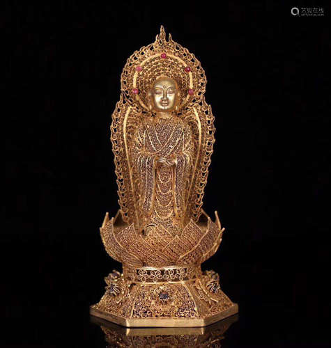 A GILT SILVER FLORAL FILIGREE BUDDHA STATUE