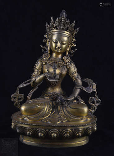 A BRONZE MOLDED BUDDHA STATUE