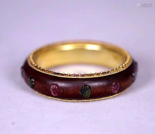 A GILT SILVER INLAID CHENXIANG WOOD BANGLE