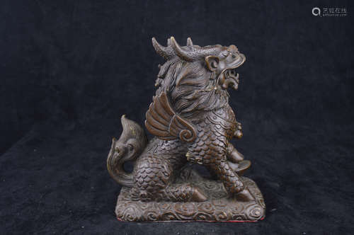 A QILIN BEAST SHAPED BRONZE FIGURE