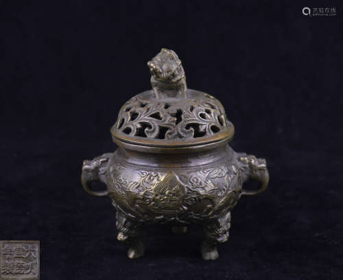 A BRONZE MOLDED HOLLOW DESIGN CENSER