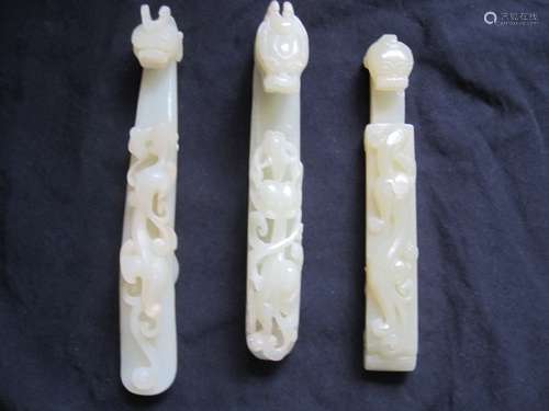 Three Jade Carved Buckles, 19th century,