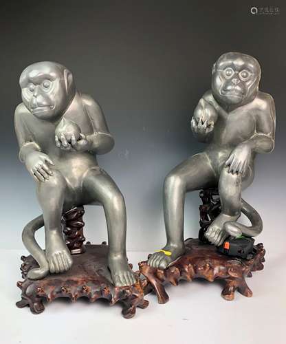 A Pair Of Aluminum Monkeys