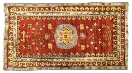 HAND-TIED KHOTAN RUG 8'1